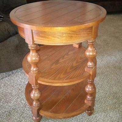 LOT 8 ROUND 3 TIER WOODEN TABLE  (Front room)