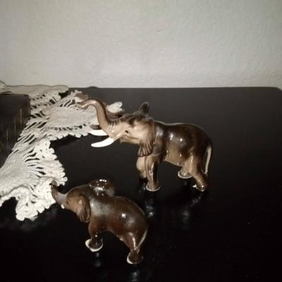 LOT 19 ELEPHANT CANDLE HOLDER WITH 4 SMALL ELEPHANTS  (Front room)