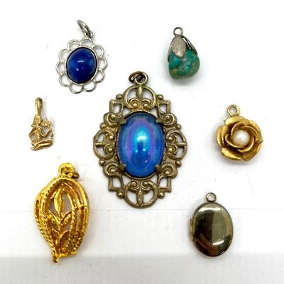 Lot of seven pendants blue green golden