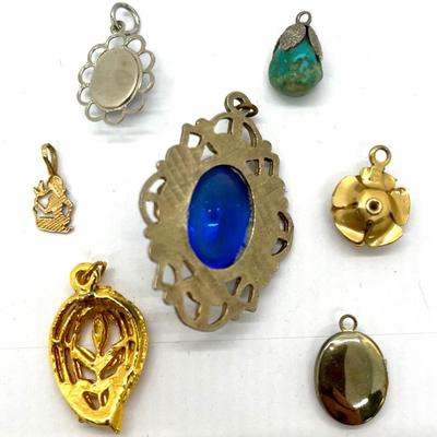 Lot of seven pendants blue green golden
