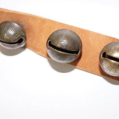 ANTIQUE BRASS ENGRAVED SLEIGH BELLS RESTRUNG ON A LEATHER STRAP 13 RESTORED OR CLEANED BELLS