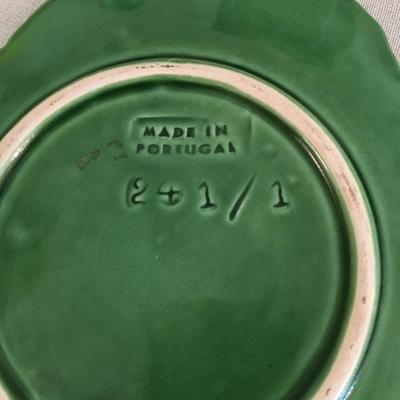 Two Cabbage style bowls and plates