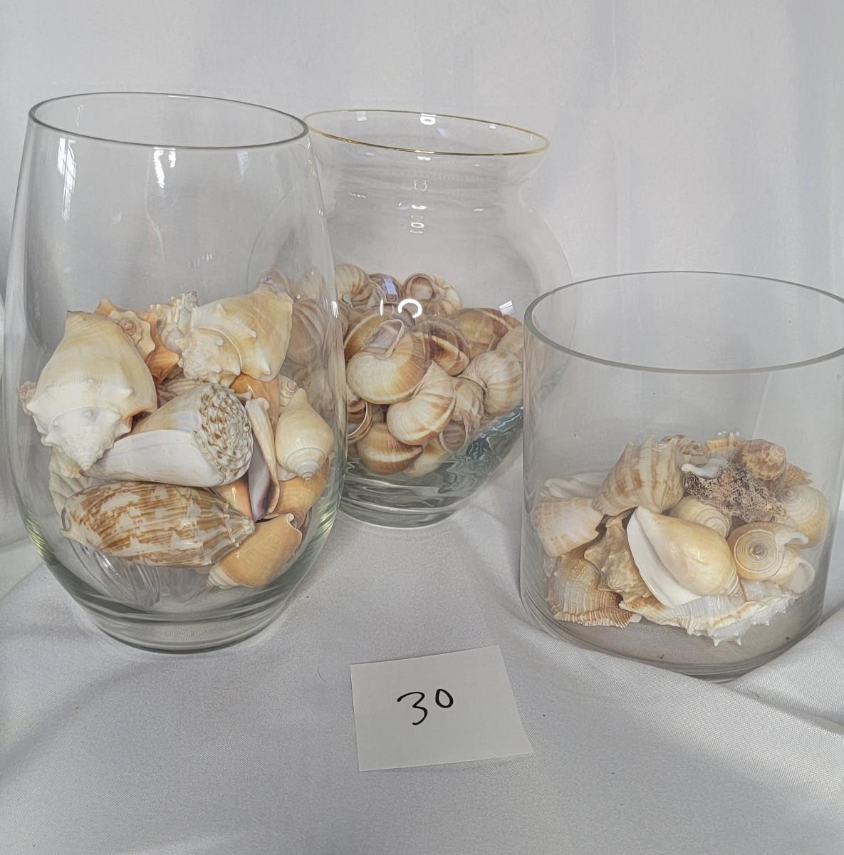 Glass containers and seashells
