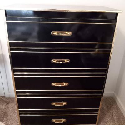 LOT 58  BLACK CHEST OF DRAWERS WITH GOLD HANDLES AND ACCENTS (1st bdr)