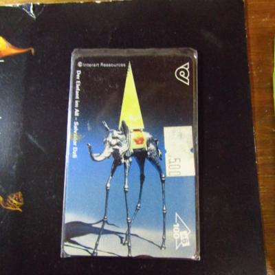 Salvadore Dali Themed Items- Playing Cards and Folder with Artistic BEZEQ Phone Cards