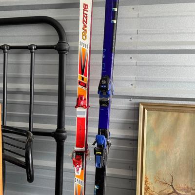 2 pair of snow skis