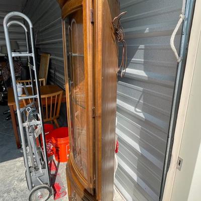 Glass front corner curio cabinet
