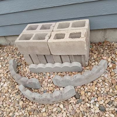 LOT 79  EIGHT CINDER BLOCKS AND 4 CEMENT BORDERS