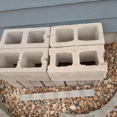 LOT 79  EIGHT CINDER BLOCKS AND 4 CEMENT BORDERS
