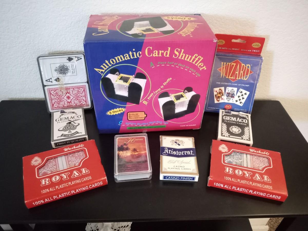 LOT 112 AUTOMATIC CARD SHUFFLER, DECKS OF CARDS AND WIZARD CARD GAME