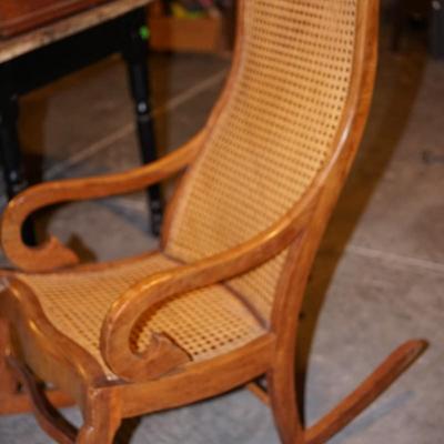 ANTIQUE LINCOLN STYLE CANED ROCKER