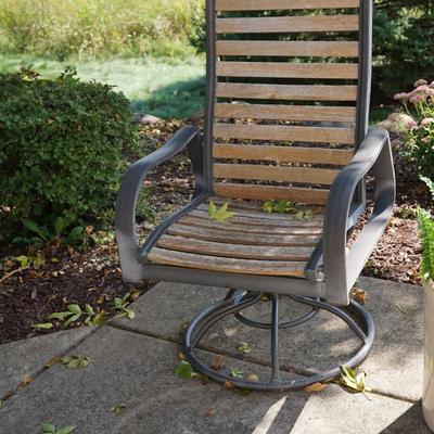 PAIR OF METAL AND WOOD SLAT SWIVEL CHAIRS WITH METAL PATIO TABLE