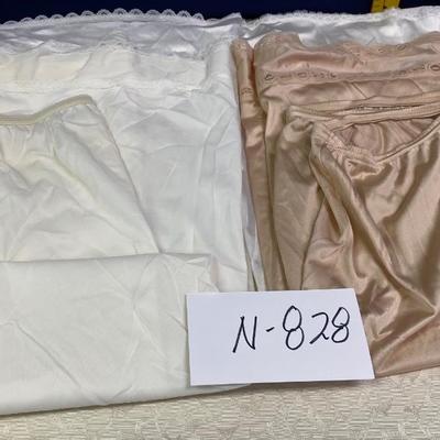 4 Ladies Slips 1-med, 1 lg, 1 xl and 1 2xl