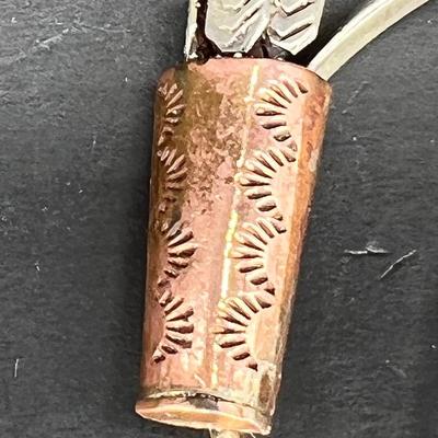 Sterling silver and copper bow pin