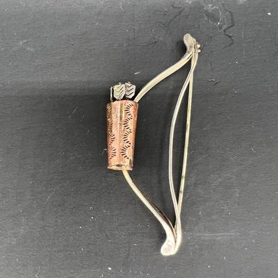 Sterling silver and copper bow pin