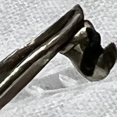 Sterling silver and copper bow pin