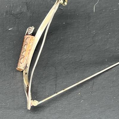 Sterling silver and copper bow pin