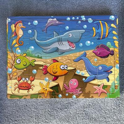 3 cardboard puzzles