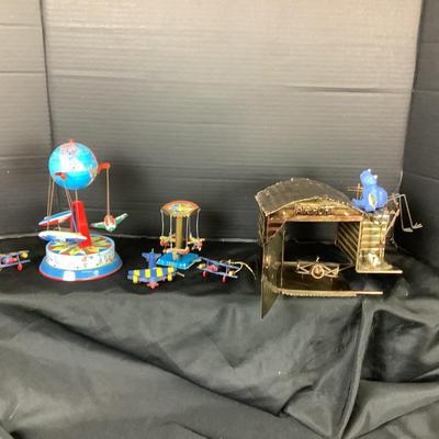 LOt. 6024. Vintage Oxidized Copper Airport Hanger Music Box and Tin Plane Carousels