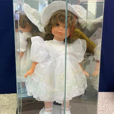 Doll in Cabinet