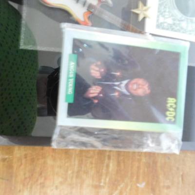 The Original AC/DC Dollar Bill on Display with Trading Cards ...