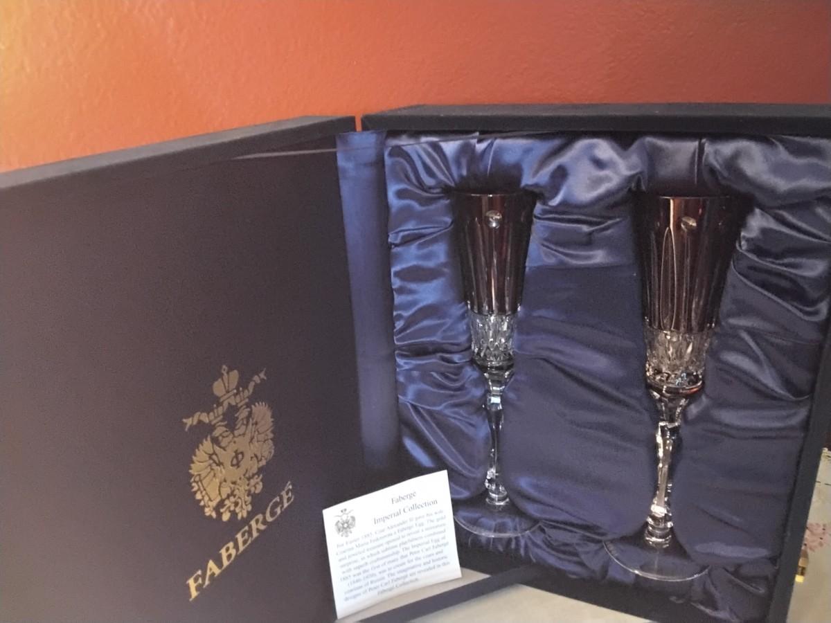 FABERGE Set of 2 XENIA Ruby Red Cut to Clear Crystal Champagne Flutes  signed in Presentation Box | EstateSales.org