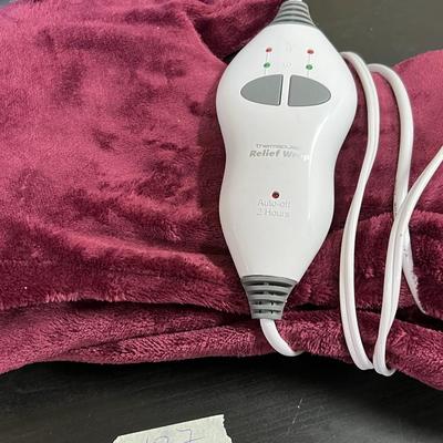 LOT with items for pets, vase, and heater