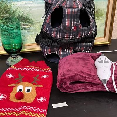 LOT with items for pets, vase, and heater