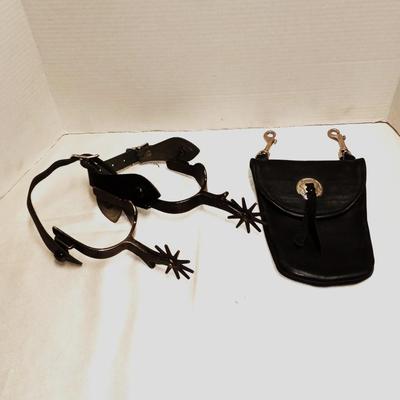 PAIR OF SPURS AND WOLFTRAX LEATHER POUCH