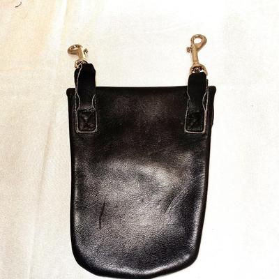 PAIR OF SPURS AND WOLFTRAX LEATHER POUCH