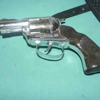 TWO VINTAGE CAPGUNS IN HOLSTERS