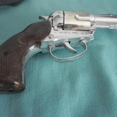 TWO VINTAGE CAPGUNS IN HOLSTERS