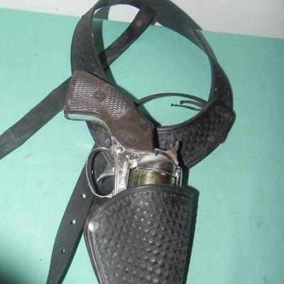 TWO VINTAGE CAPGUNS IN HOLSTERS