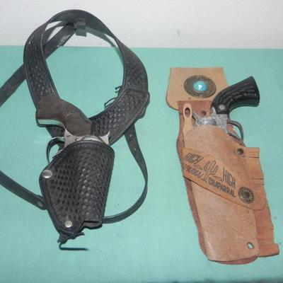 TWO VINTAGE CAPGUNS IN HOLSTERS