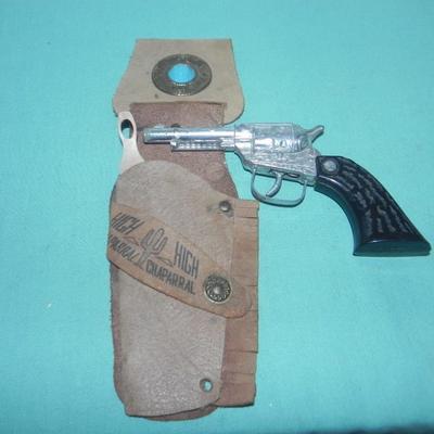 TWO VINTAGE CAPGUNS IN HOLSTERS