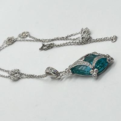 LOT 202: Erica Courtney Diamonique 22 ct tw Sterling Silver Aqua Tormaline Enhancer/Pendant on 20" Chain