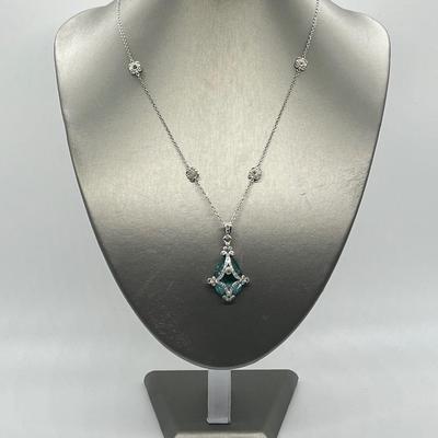 LOT 202: Erica Courtney Diamonique 22 ct tw Sterling Silver Aqua Tormaline Enhancer/Pendant on 20" Chain