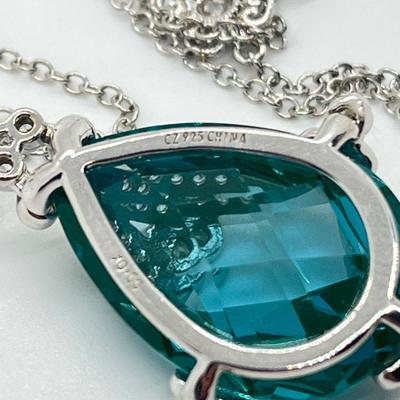 LOT 202: Erica Courtney Diamonique 22 ct tw Sterling Silver Aqua Tormaline Enhancer/Pendant on 20" Chain