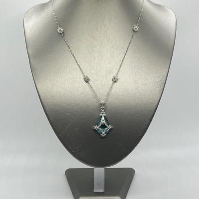 LOT 202: Erica Courtney Diamonique 22 ct tw Sterling Silver Aqua Tormaline Enhancer/Pendant on 20" Chain