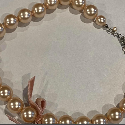 LOVELY costume jewelry necklace with velvet bow, similar peach color