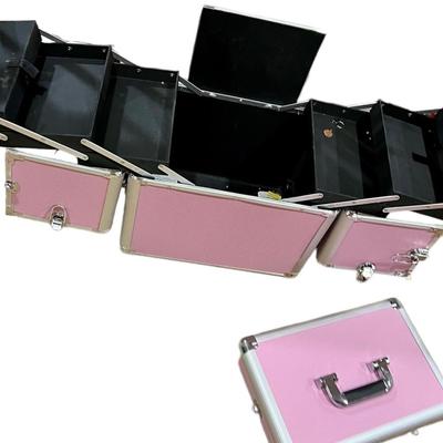 Travel jewelry case on wheels with telescoping handle