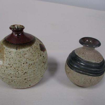 Pair of Signed Pottery Vases