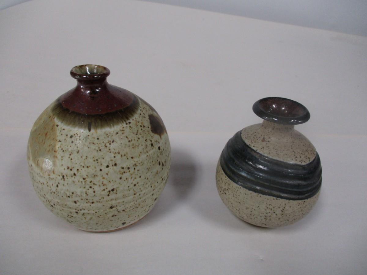 Pair of Signed Pottery Vases | EstateSales.org