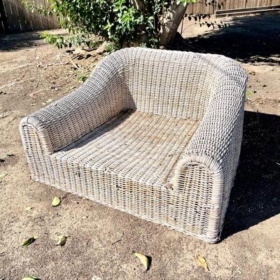 LOT B  MICHAEL TAYLOR DESIGNS OVER SIZE WEATHERED WICKER LOUNGE CHAIR 