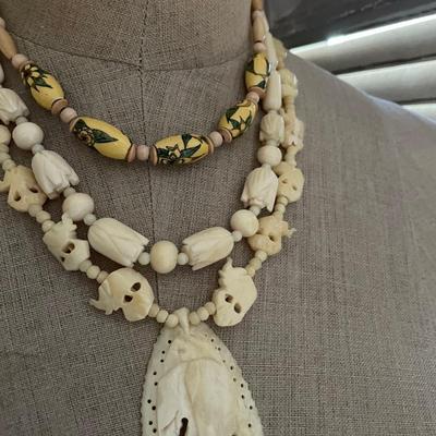 Lot LL Trio of vintage stone, shell and wood necklaces