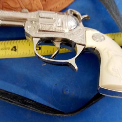 LOT 16  VINTAGE TOY GUN AND HOLSTER
