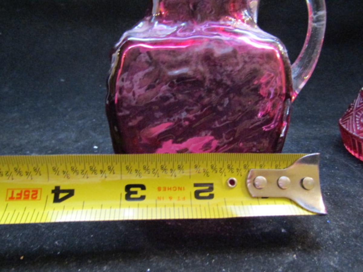 Pair of Cranberry Glass Pitchers (98)
