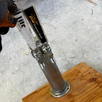 CO2 tank with beer tap handles