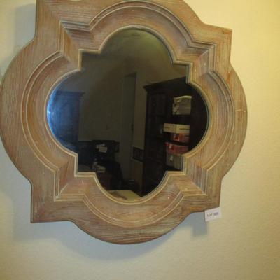 Wood-framed Mirror and Decorative Floral Overhang