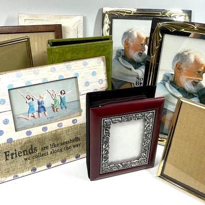 Lot of picture frames and photo books various sizes